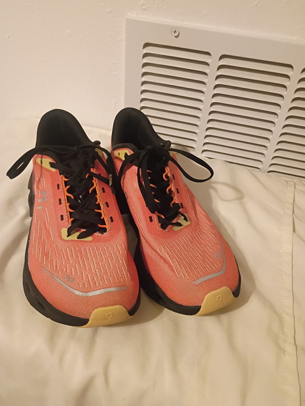 On Running Women's Running Shoe in Black and Orange